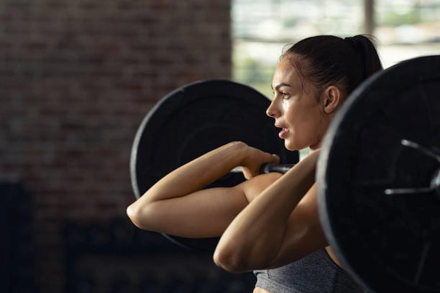 Strength training for women exercising in a gym