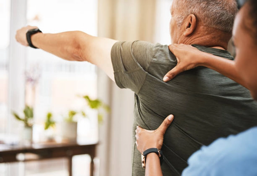 Patient receiving personalized shoulder rehabilitation therapy.